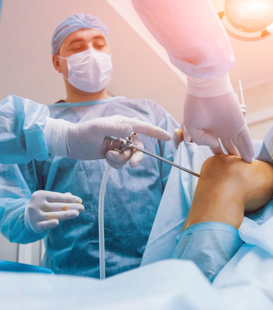 Orthopedic surgeon providing surgical treatment