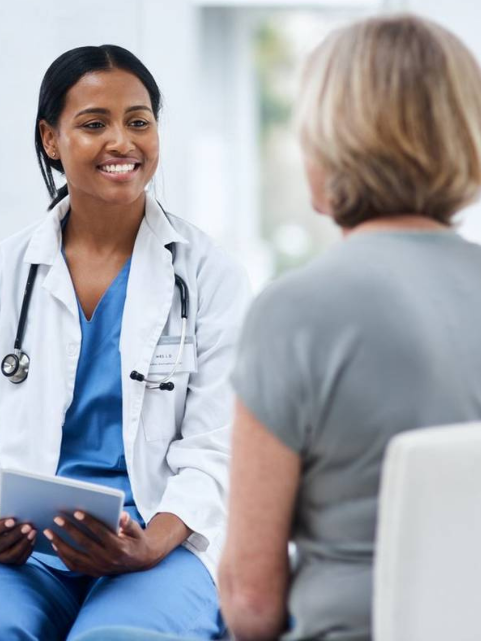 Specialty care provider reviewing a treatment plan with a patient