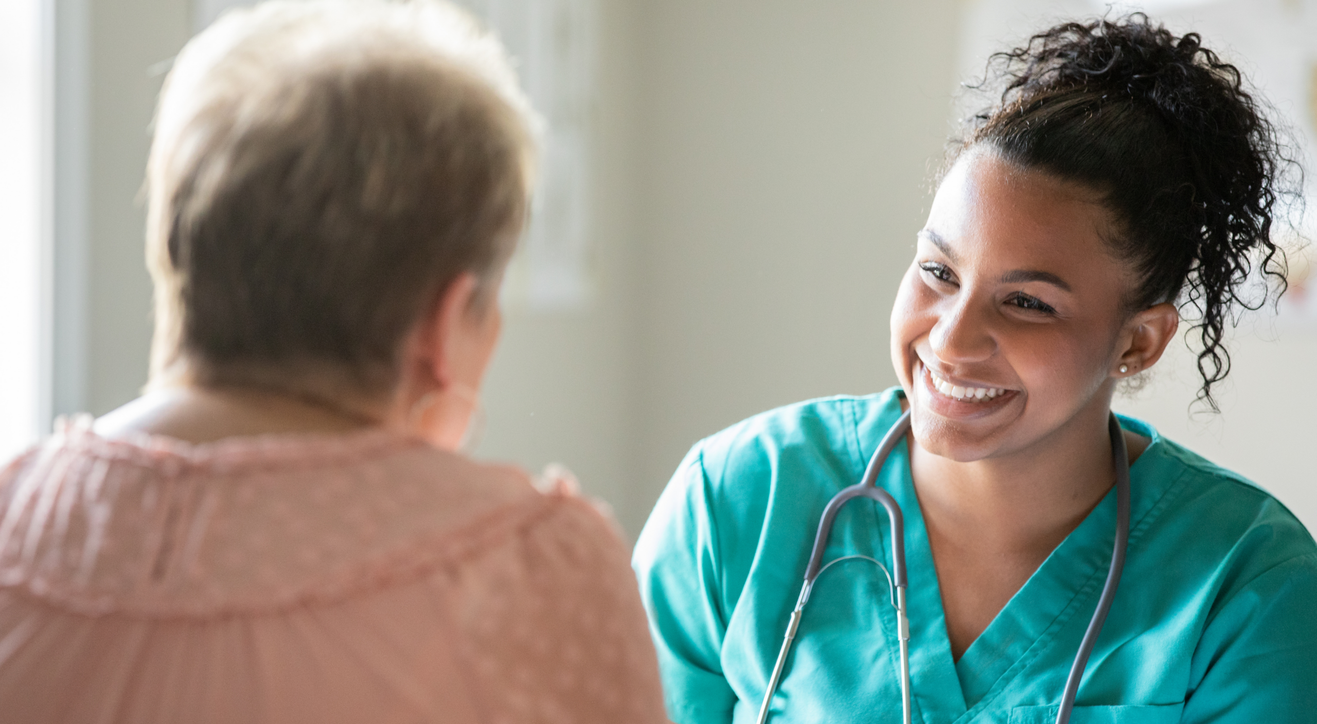 Patient receiving helpful information from a Martin County Hospital District staff member