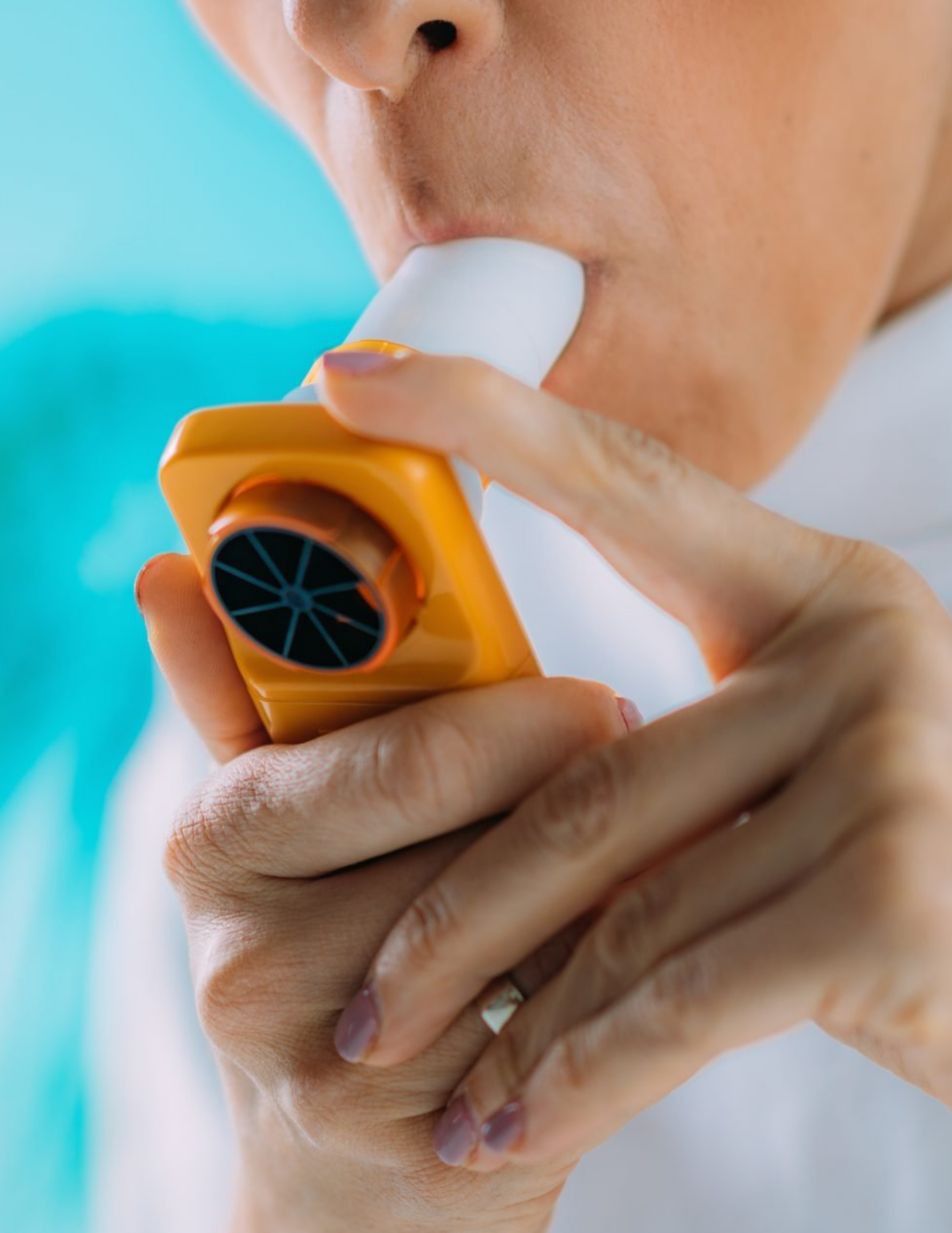 Patient performing a pulmonary function breathing test