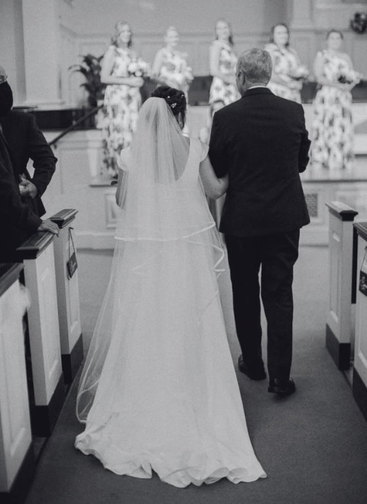 Father walking his daughter down the aisle