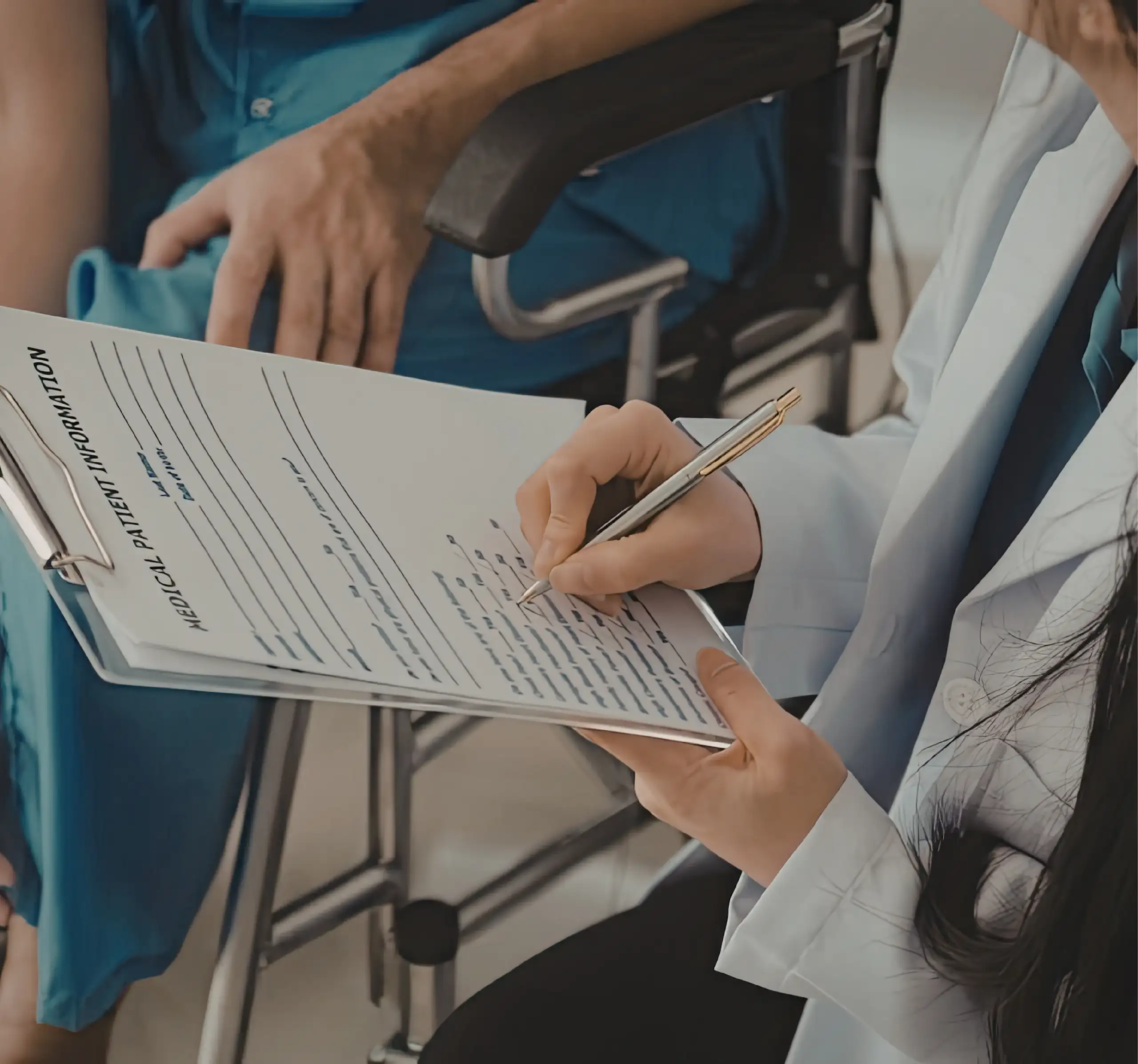 A healthcare professional reviewing medical cost information with a patient